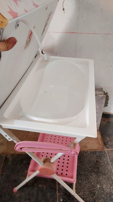 Muda fraldas e banheira