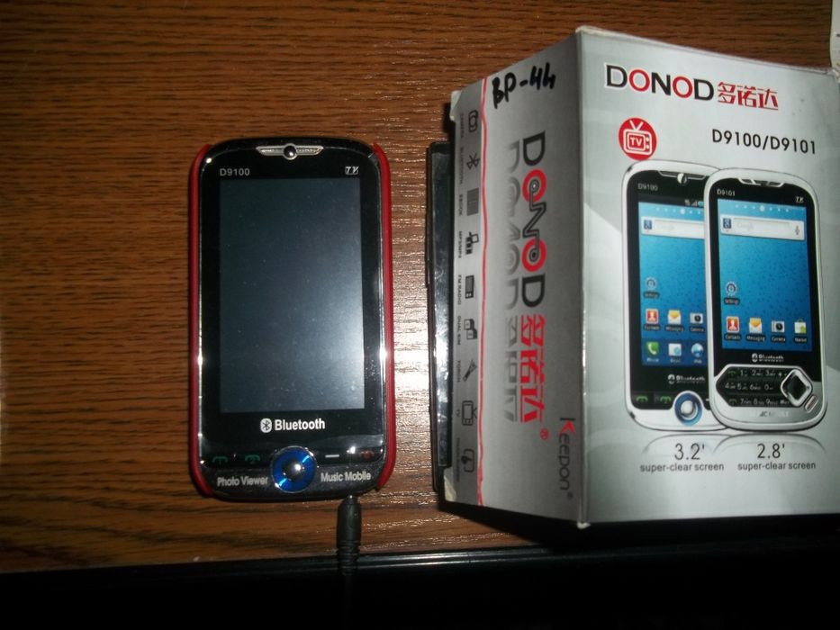 Сенсорный телефон данод . телевизор