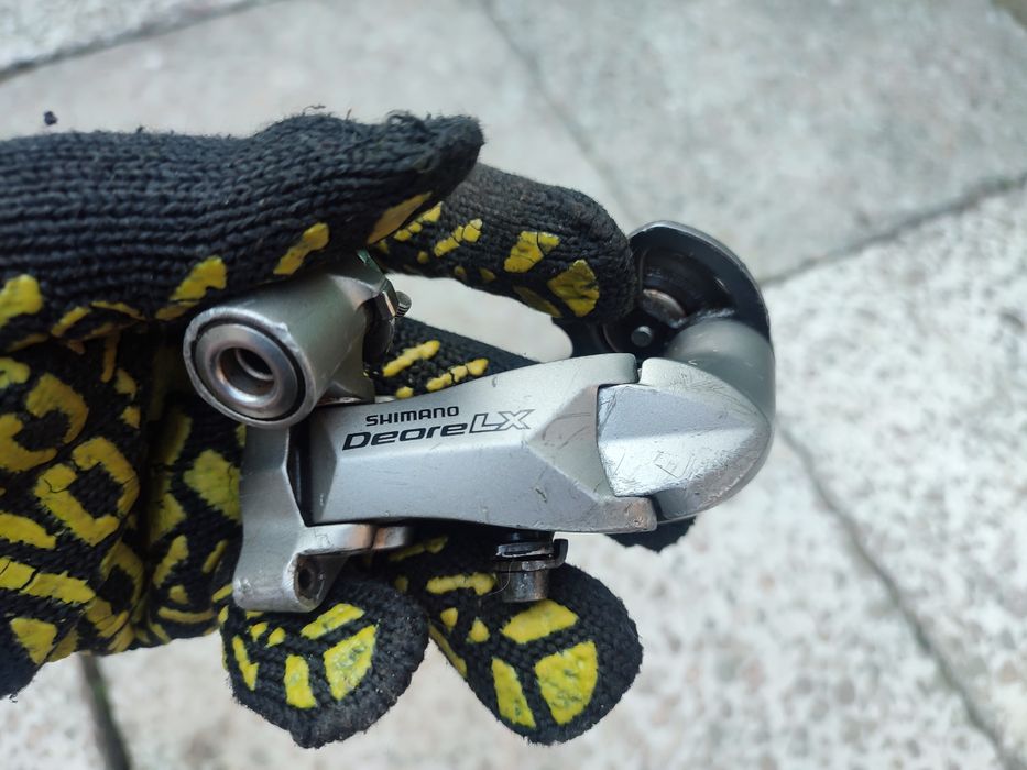Задний переключатель Shimano DEORE LX RD-M580 GS на 9 скоростей: 1