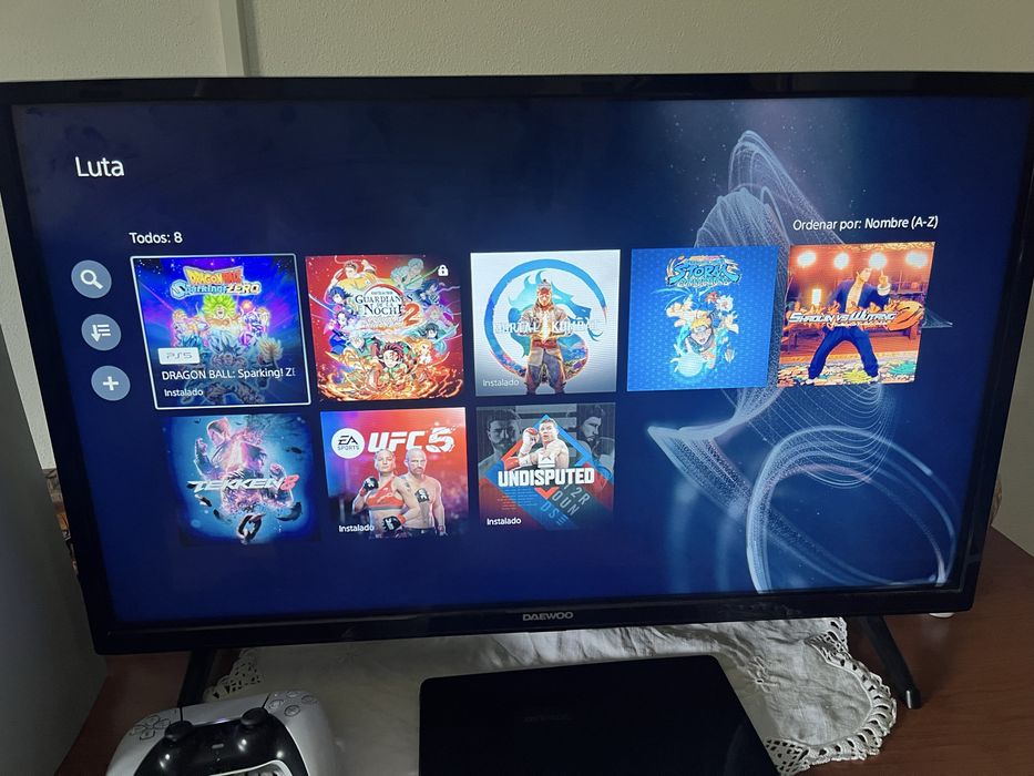 Ps5 dois comandos conta com varios jogos …… tem fifa 26