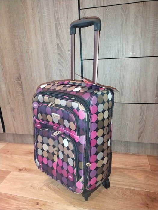 Чемодан  ORMI  новый XS