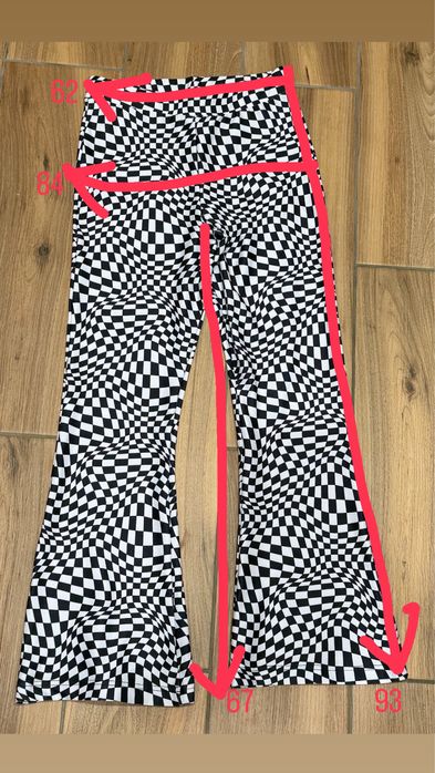 Стильні штани-кльош FB Sister в шаховий принт