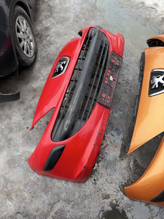 Бампер передній Peugeot 207