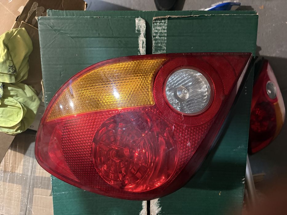 Hyundai coupe 02-06 lampa tyl tylna lewa prawa komplet