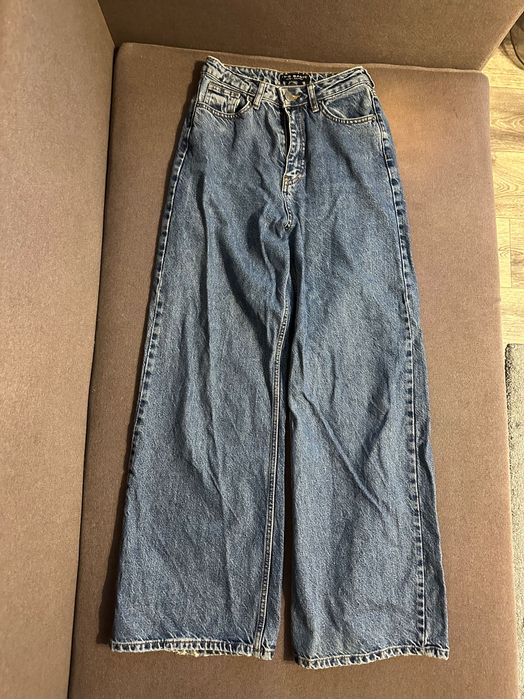 Широкі сині джинси