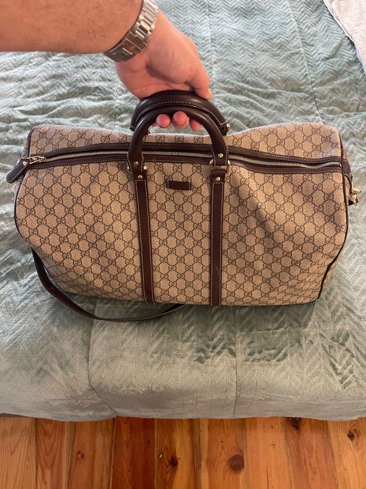 Gucci Travel Bag Monogrammed Coated Canvas
Beige