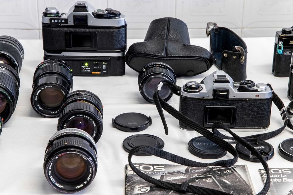 Lote de câmeras fotográficas+objetivas+acesórios