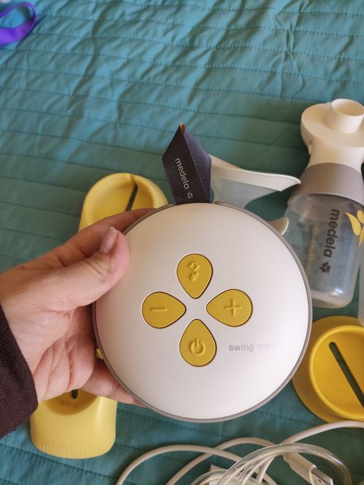 Bomba extratora medela swing maxi dupla + 23 acessórios
