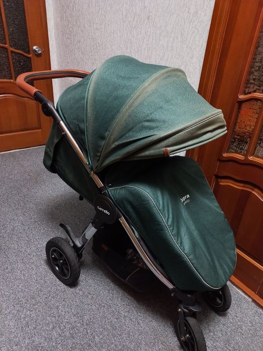 Продам прогулянковий візок, коляску  Carello Supra, надувні колеса.