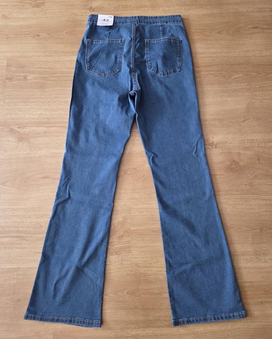 Nowe dżinsy dzwony Sinsay L/XL