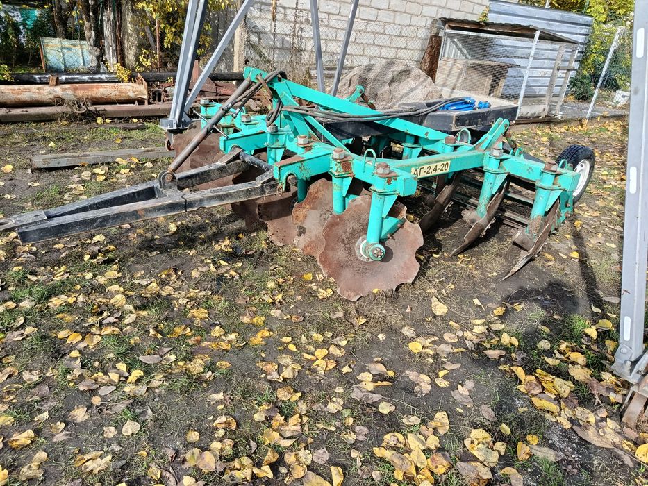 Причіпний пристрій для дискової борони