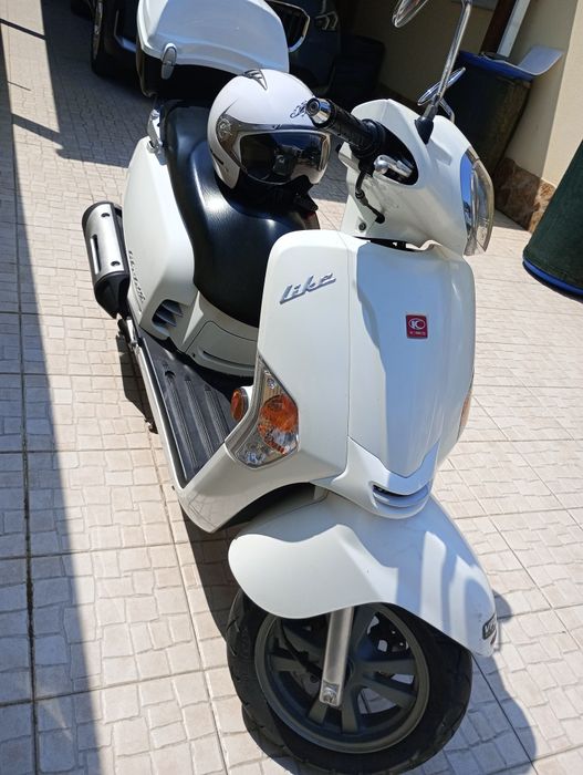 Vendo motorizada kynco like 125cc de 2015 com   20500 km
