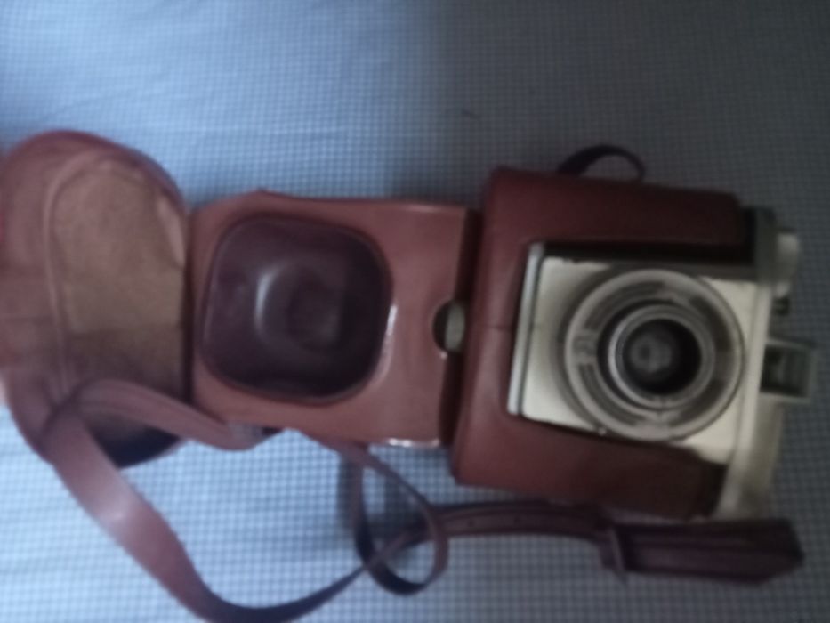 Máquina vintage com bolsa