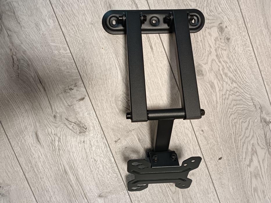 Кріплення для телевізора з поворотом