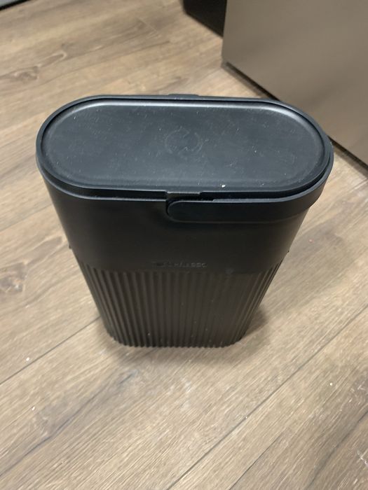 Depósito capsulas usadas