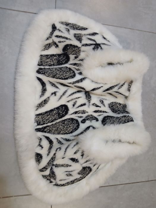 Жилетка без рукавів