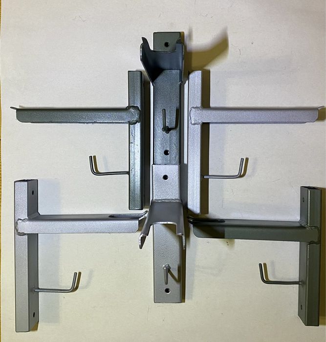 Кріплення, тримач, кронштейн для бензопили, триммера