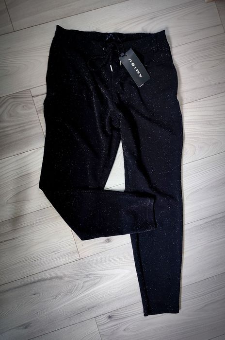 Nowe spodnie srebrna nitka 36/38