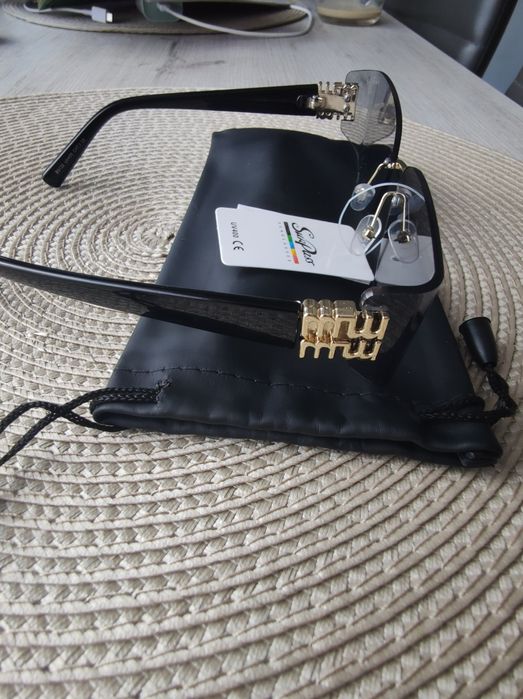 Okulary przeciwsłoneczne miumiu