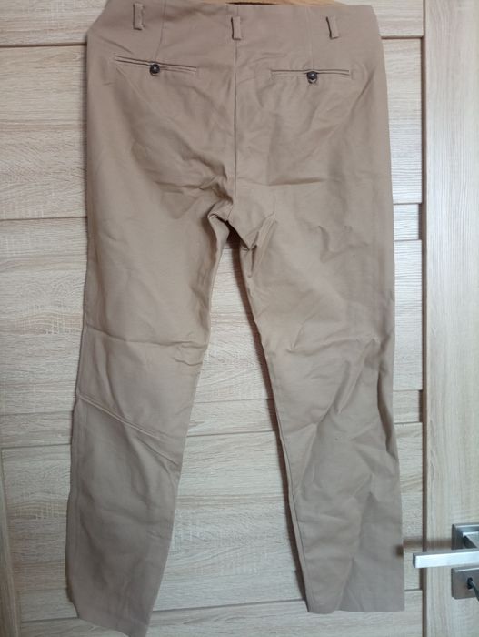 Beżowe spodnie biurowe 38
