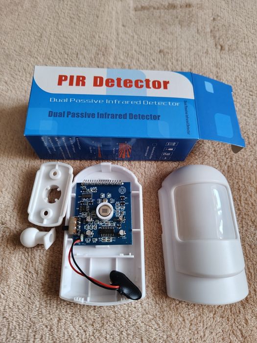 Датчик руху та відкриття для сигналізації