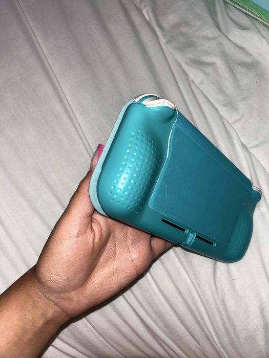 Nintendo Switch Lite Turquesa + Super Mario + Acessórios