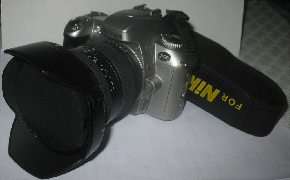 Nikon F55, Lente Tamron AF 19-35mm, Filtro Nikon NC 77mm,Bolsa Soligor