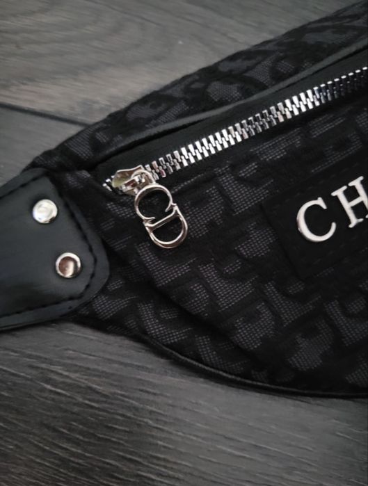 Nowa czarna nerka Christian Dior