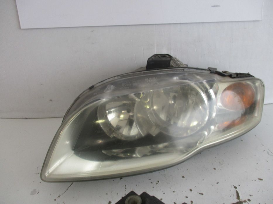 Farol Optica Audi A4 2005