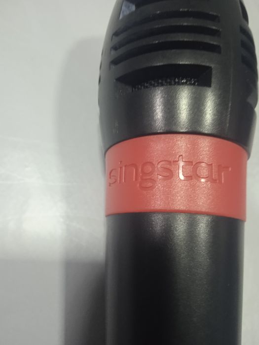 Dois microfones como novos