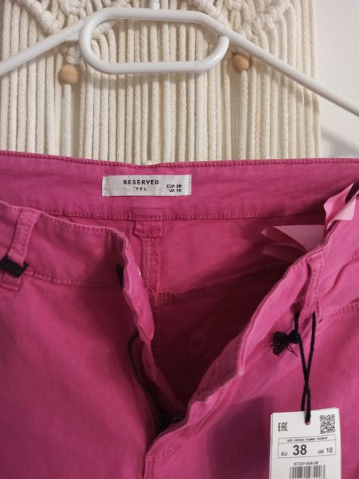 Nowe spodnie różowe Reserved r. 38