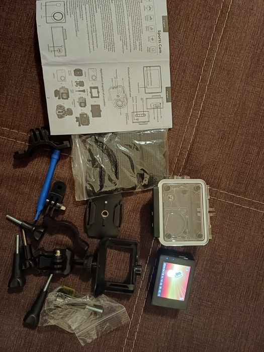 Câmara de ação 1080p, com tripé extensível.