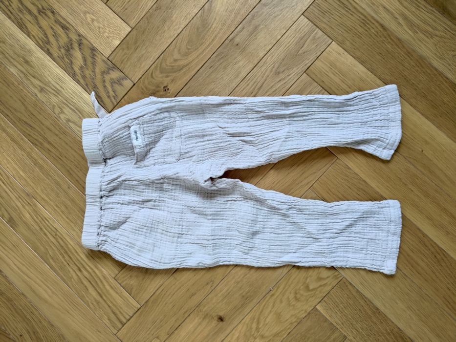 Muslinowe beżowe spodnie Newbie r. 92 nowe bez metki