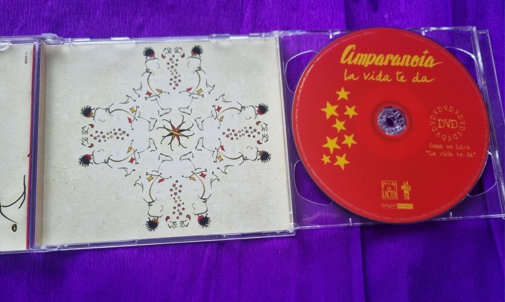 Cd/Dvd- Amparanoia, la vida te da