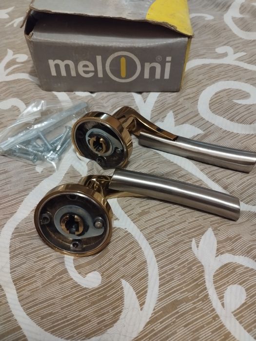 Дверні ручки Meloni