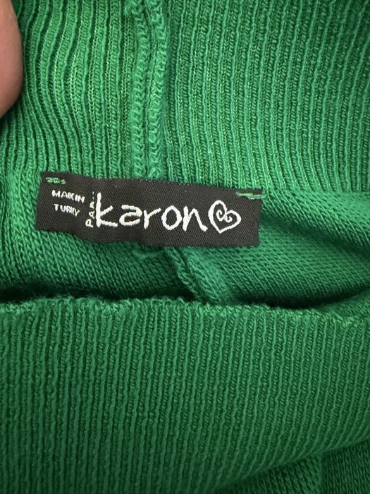 Зелений вʼязаний костюм