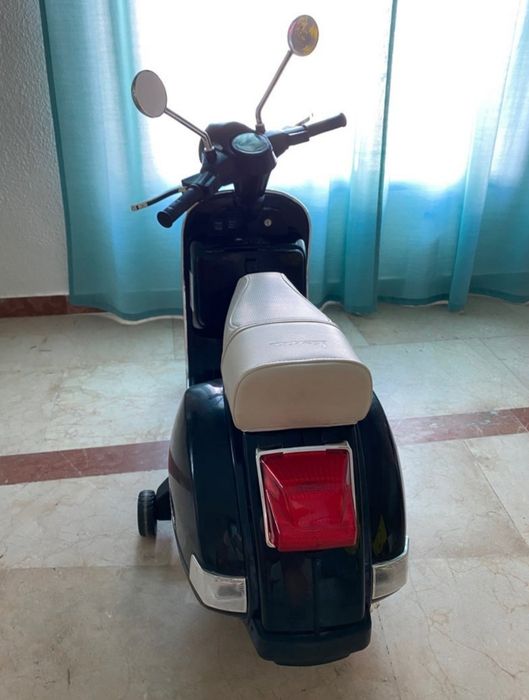 Vespa eletrica criança.