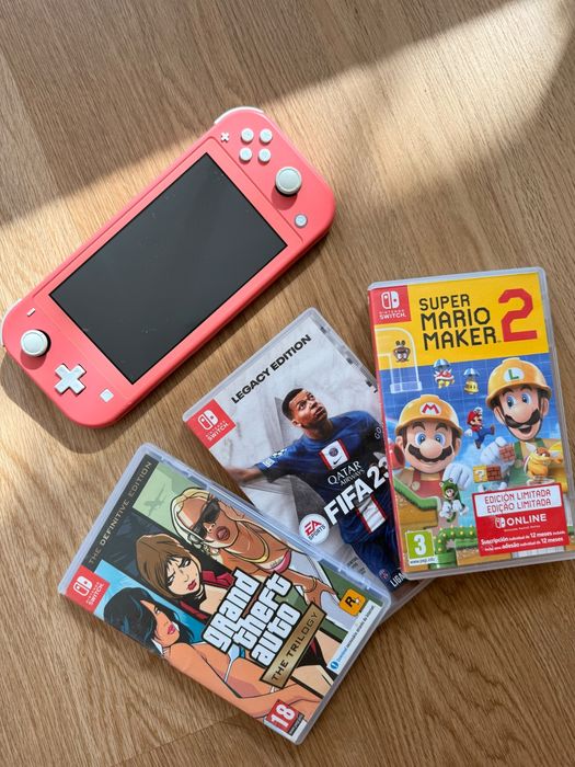 Nintendo Switch Lite + 3  jogos