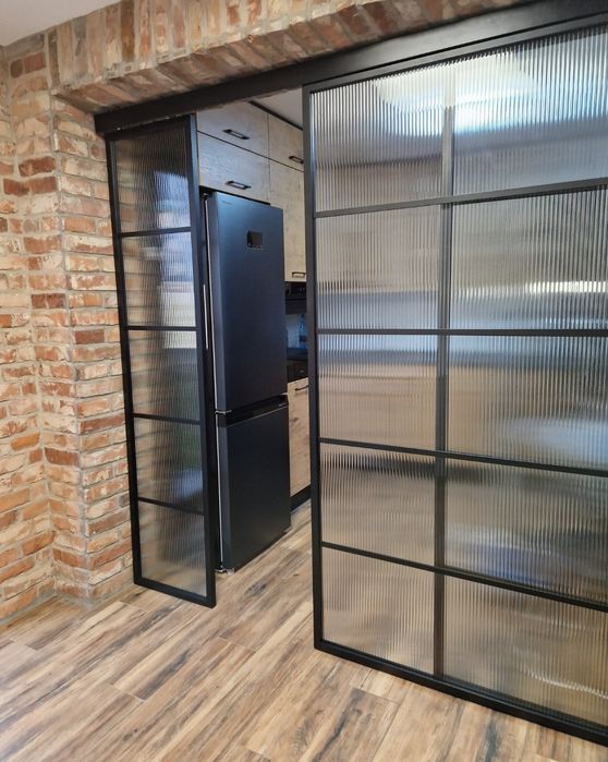 Drzwi przesuwne, ścianka działowa szklana styl loftowy