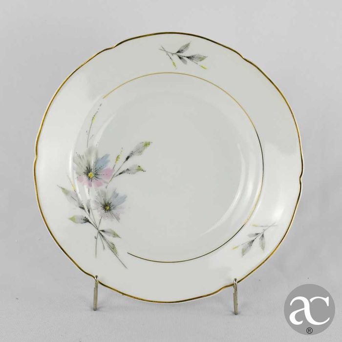 Prato fundo em porcelana Artibus, decorado com flores e friso a ouro