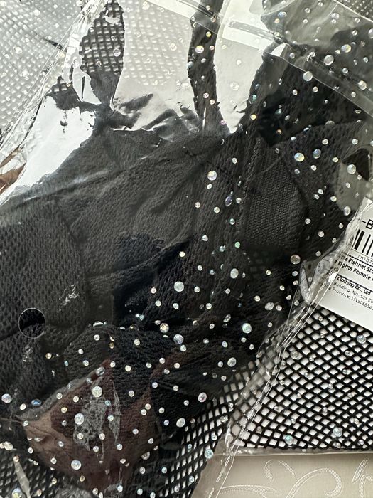 Колготи , колготки в сітку з камнями , стразами . Колготки в стразах .