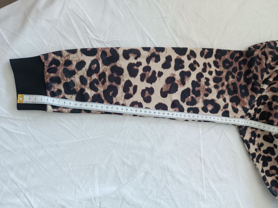 Casaco leopardo novo