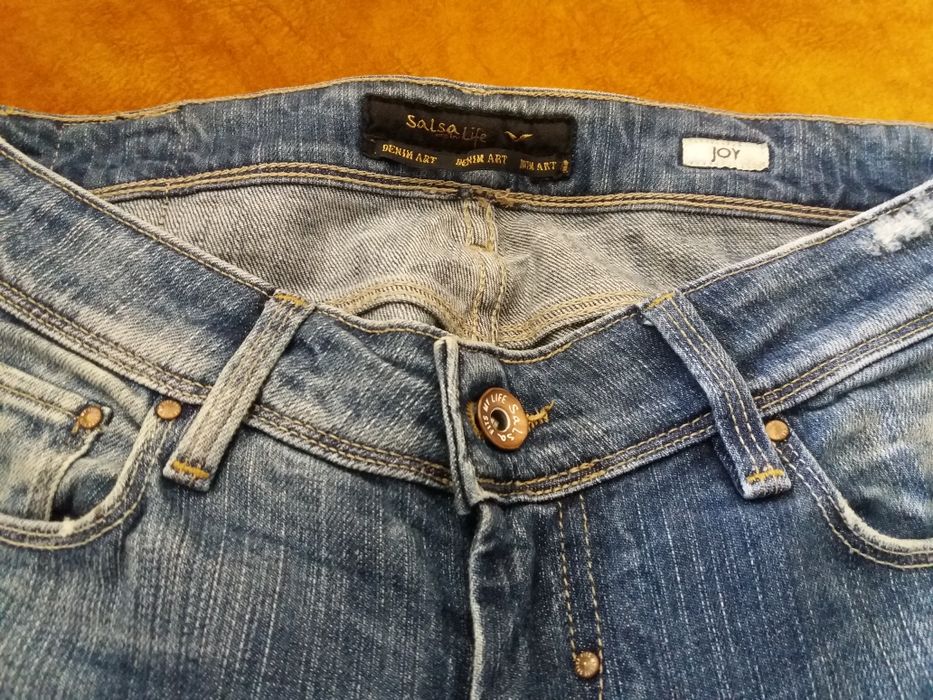 Calças novas da salsa