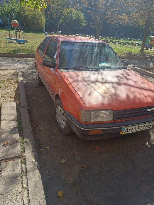 Мазда 323 Mazda автомобиль