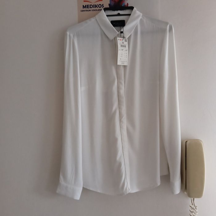 Biała koszula rozm.32, marki Mohito.