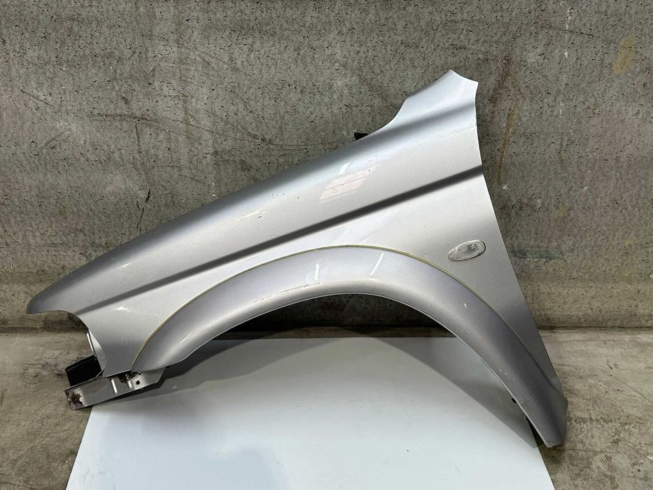 Guarda Lamas esquerdo Mitsubishi Pajero Sport Wagon (2006)