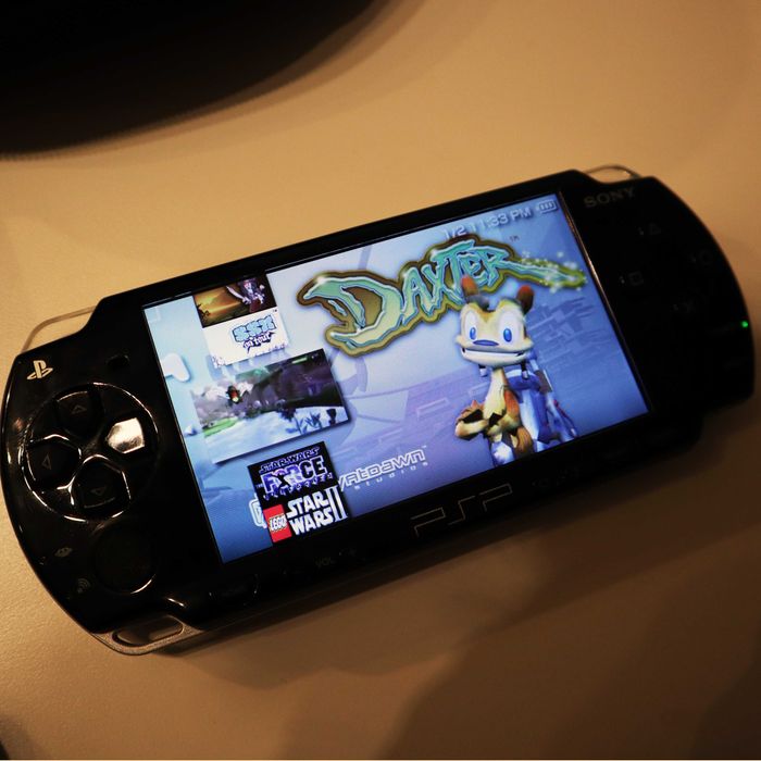 Sony Playstation PSP Slim & Lite + PRZEROBIONA 100 Gier + pokrowiec + Nowa bateria