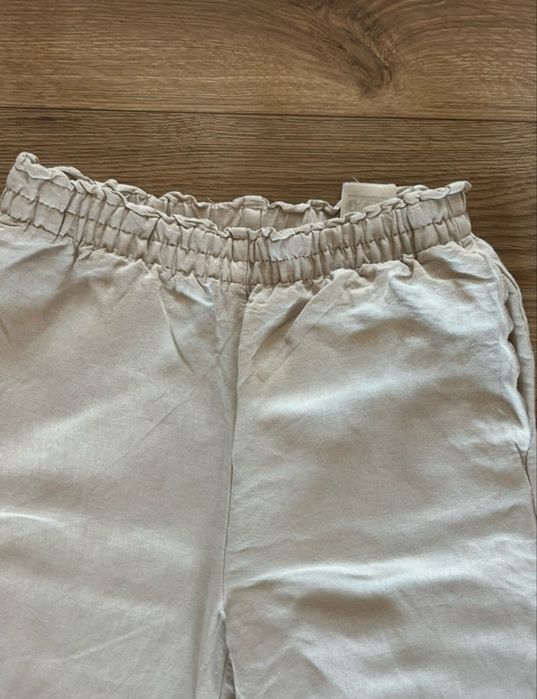 Lniane beżowe spodnie h&m