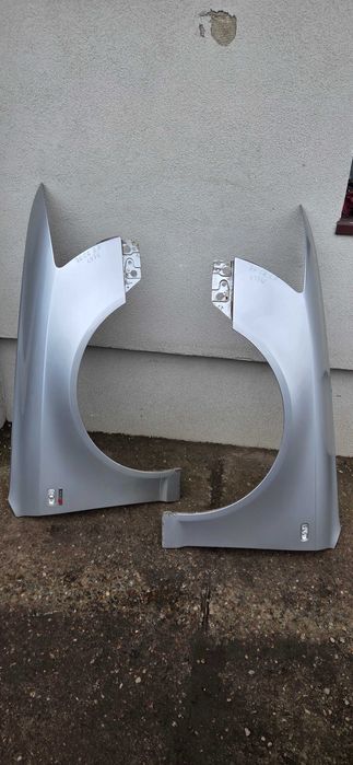 Błotnik błotniki Audi A6 C6 LY7W oryginał prawy