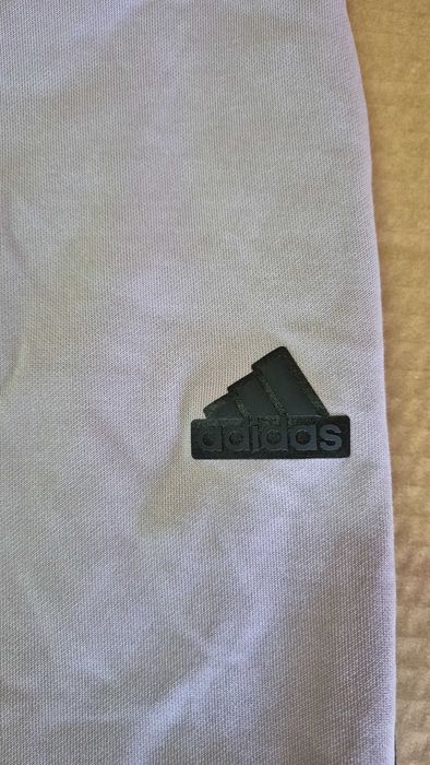 Adidas Kultowe spodnie dresowe z 3 paskami rozm M
